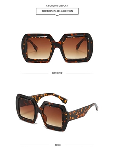 Detail view of tortoiseshell square oversized sunglasses with brown gradient lenses