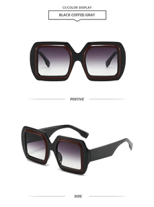 Detail view of square frame sunglasses in black coffee finish with gradient gray lenses