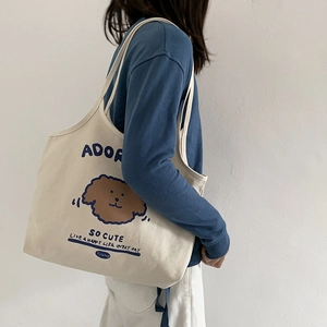 Minimalistische beige Canvas-Tragetasche mit süßem Cartoon-Hund und blauer Typografie