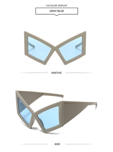 Macro view of geometric butterfly sunglasses with gray frame and light blue lenses