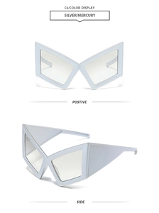 Front and side view of futuristic silver butterfly wing oversized sunglasses