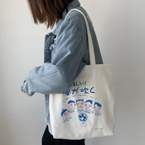 Japanese style white canvas tote bag with cute cartoon illustration and shoulder strap