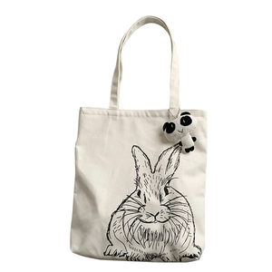 Japanese style cream canvas tote bag with cute rabbit print and panda plush charm