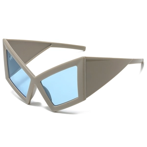 Oversized butterfly wing sunglasses with beige frames and light blue transparent lenses