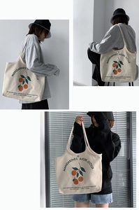 Détail du grand sac cabas en toile avec imprimé mandarine vintage et texte français élégant