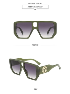 Detailed view of oversized square jelly green sunglasses with metallic temple accents