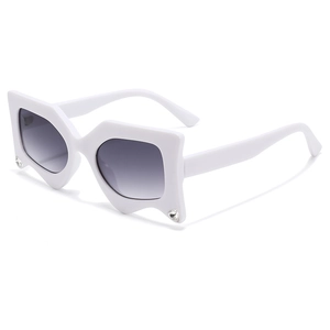 White star-shaped irregular sunglasses with rhinestone accents and grey lenses