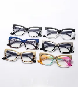 Detail view of multi-style cat-eye glasses frames with various patterns and color blocking