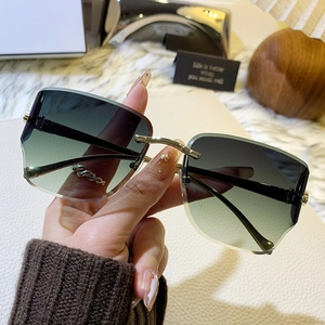 Lunettes de soleil sans monture avec décor léopard en métal et verres dégradés