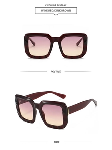 Detail view of wine red rectangle sunglasses with gradient lenses and wavy texture frame