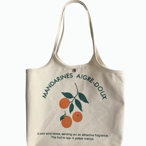 Sac fourre-tout minimaliste en toile crème avec imprimé orange et bouton pression