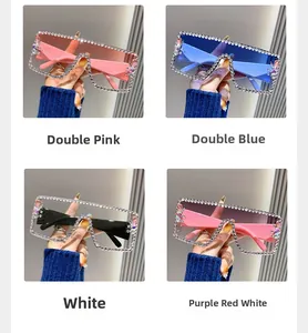 Detail of oversized sunglasses with rhinestones in pink, blue, white and purple red
