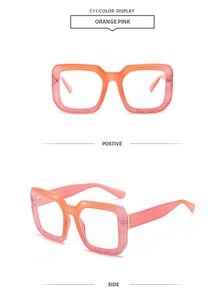 Detail view of orange pink rectangle sunglasses with marble texture frames