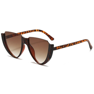 Tortoiseshell shield sunglasses with gradient lenses and avant-garde geometric frame