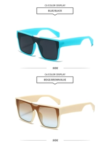 Detail of square oversized sunglasses in blue and beige frames with gradient lenses