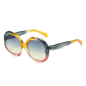 Vintage oval sunglasses with a multi-color gradient frame and blue-yellow tinted lenses