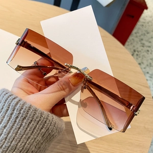Retro rimless square sunglasses with gradient brown lenses and gold leopard metal detail