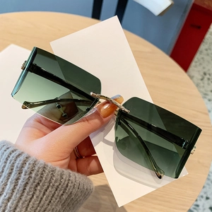 Retro rimless square sunglasses with dark green gradient lenses and gold metal temples