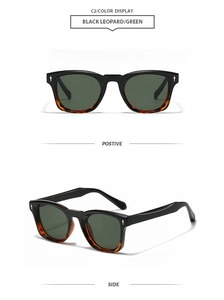 Detail view of square black sunglasses with leopard print accents and green lenses