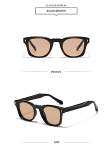 Detail of square black sunglasses with brown lenses and silver arrow metal rivets