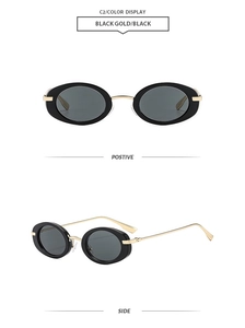 Detail view of retro oval sunglasses with black frames and gold metal temples