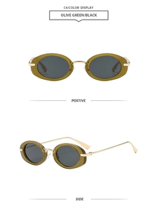 Detail view of oval olive green sunglasses with black lenses and slim gold metal temples