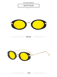 Front and side view of black oval frame sunglasses with yellow lenses and gold metal temples