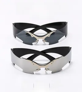 Detail of frameless bat-wing sunglasses with y2k punk metal bridge and wide temple arms
