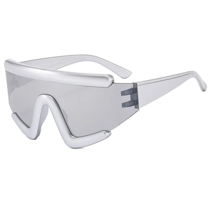 Futuristic silver oversized shield sunglasses with grey lenses shown at a 45-degree angle