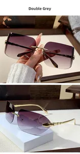 Detail view of double grey gradient rimless sunglasses with elegant gold metal temples