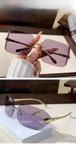 Detail of purple gradient frameless sunglasses with golden bamboo texture metal temples