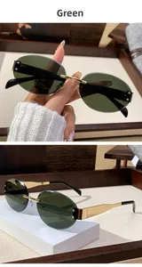 Detail of rimless oval sunglasses with dark green lenses and golden metal temples