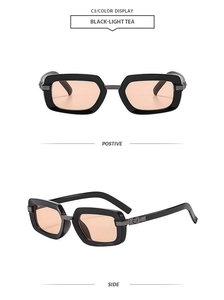Detailed view of vintage square sunglasses with silver cross flower metal engraving