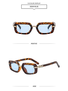 Detailed view of tortoiseshell square sunglasses with light blue lenses and gold hinges