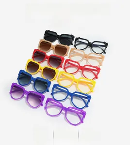 Detailed view of oversized irregular sunglasses frames showing diverse fashion colors