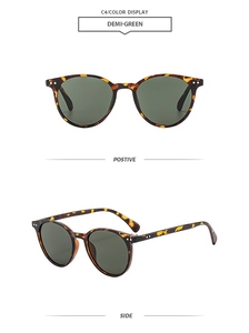 Front and side view of retro round sunglasses with tortoise frames and dark green lenses
