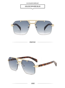 Detail of pilot sunglasses with gold metal frame, blue gradient lenses and tortoise temples