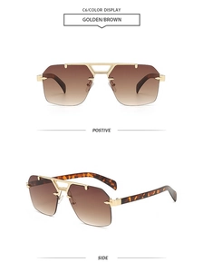 Detail view of gold metal double bridge rimless sunglasses with brown gradient lenses