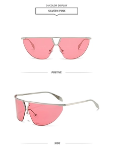 Detail of trendy semi-rimless sunglasses with pink lenses and silver metal double bridge