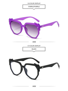 Side view of oversized geometric sunglasses with purple gradient and black frames