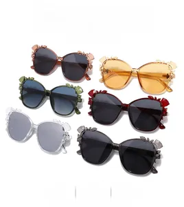 Macro shot of stylish butterfly-shaped rhinestone sunglasses in six assorted colors