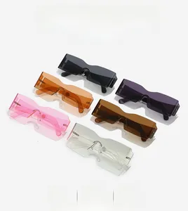 Collection of Y2K rimless wrap sunglasses in various colors including orange and pink