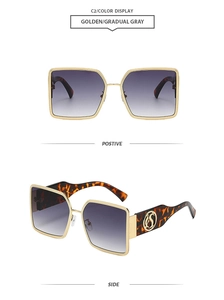 Detailansicht der goldenen quadratischen Sonnenbrille mit Verlaufsgläsern und S-Logo-Bügeln