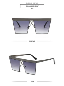 Detail view of gunmetal square sunglasses frame with unique geometric crossbar structure