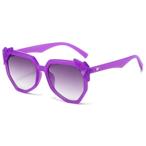 Fashionable oversized purple geometric sunglasses with translucent frame and gradient lenses