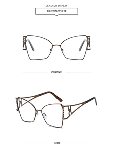 Dettaglio occhiali cat-eye marroni con intagli a pois e cerniere artistiche a doppio anello