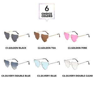 Macro view of six diverse colored heart-shaped frameless metal sunglasses with detailed temples