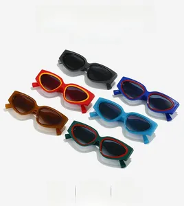 Detailed view of six colorful Y2K cat-eye sunglasses with wide frames and dark lenses