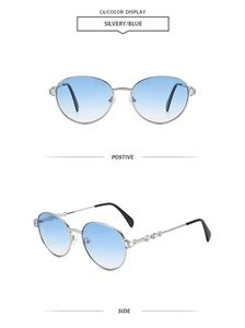 Detailed front and side views of silver oval metal sunglasses with blue rhinestone accents