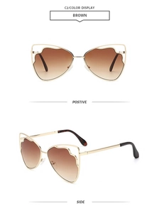 Vues détaillées de lunettes de soleil papillon en métal doré avec verres dégradés